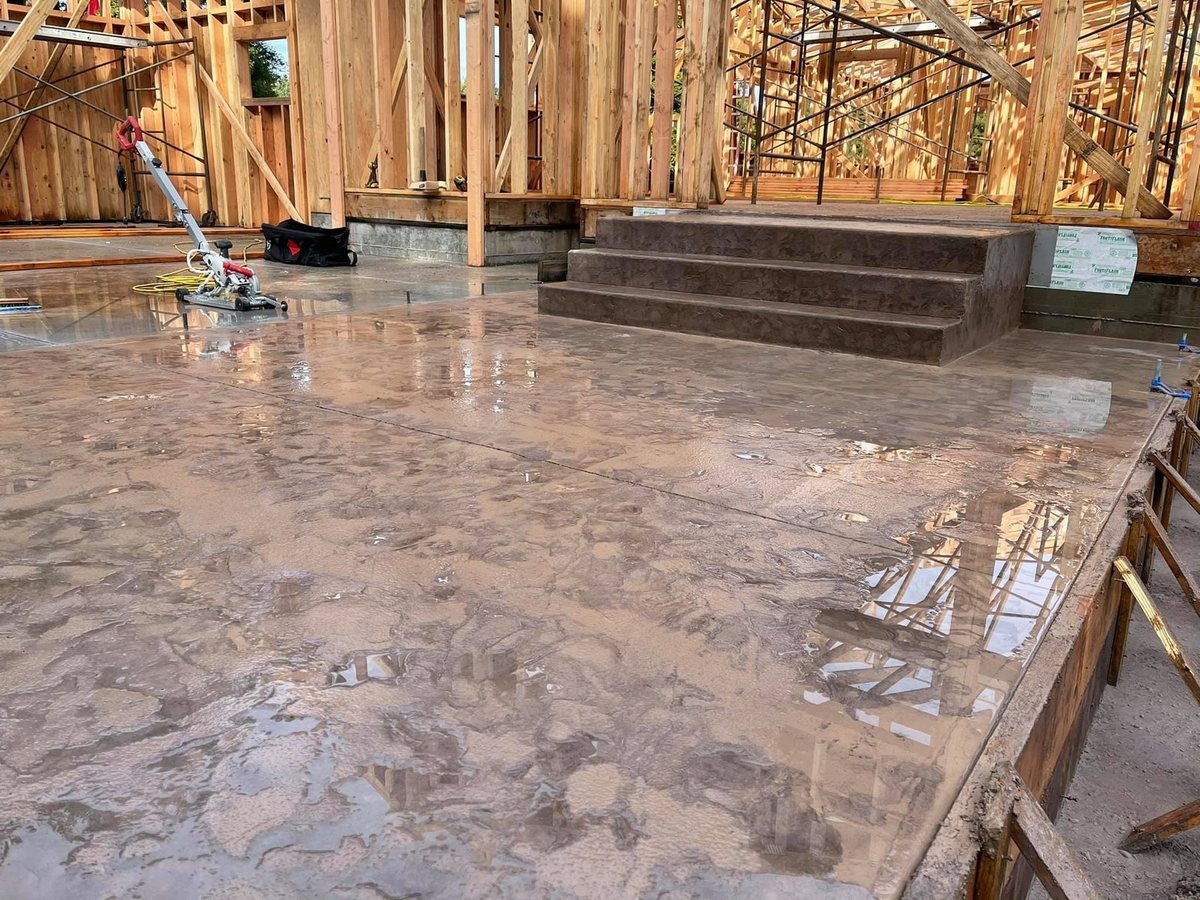 Colored concrete slab and steps poured by Matson General Contracting