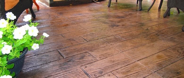 Stamped concrete patio with a wood-plank pattern by Matson General Contracting