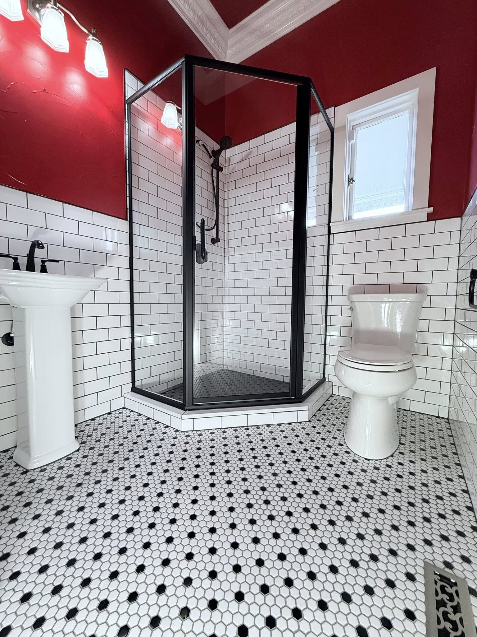 Hexagon floor tile and subway wall tile by Matson General Contracting